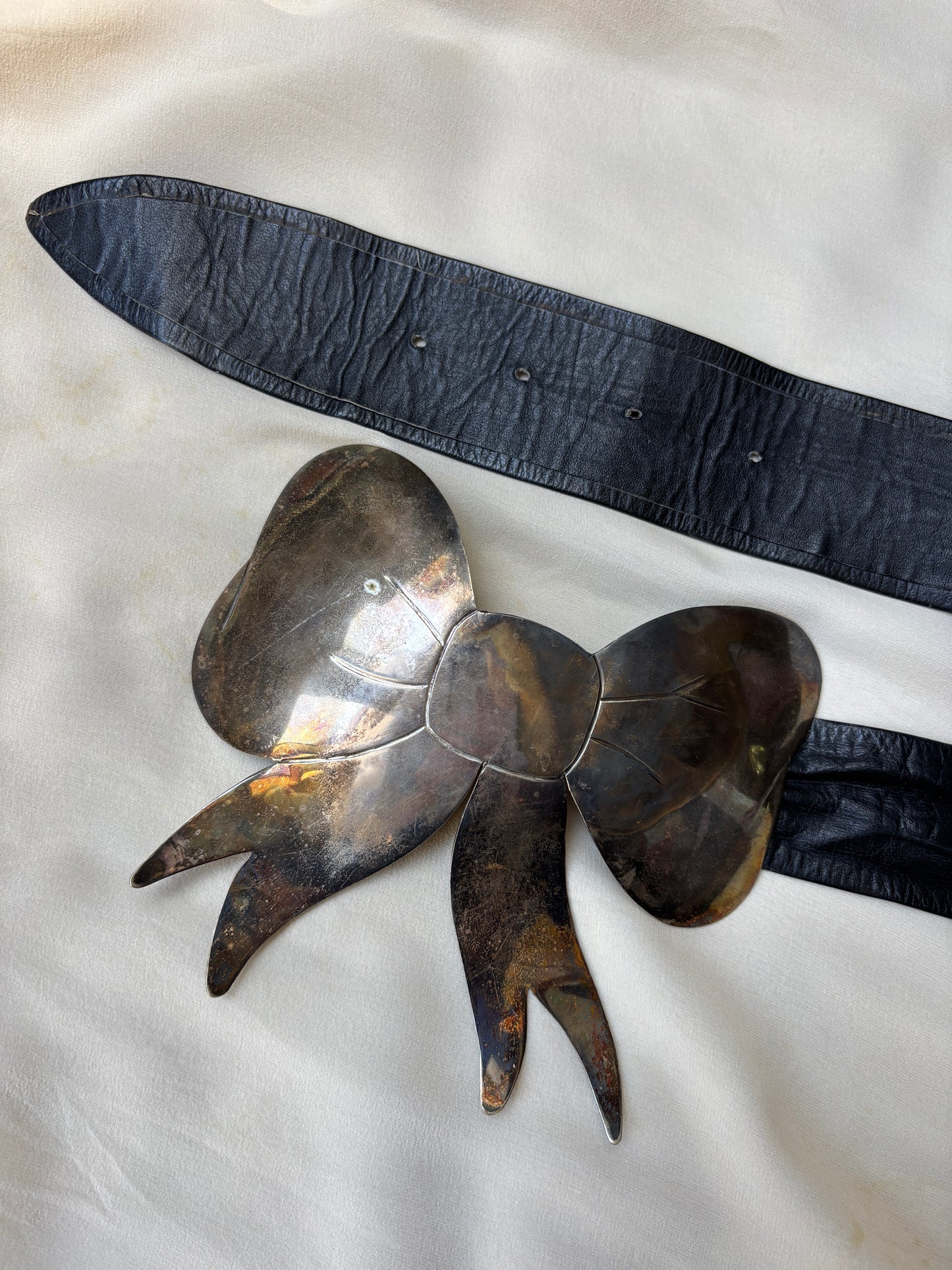 Vintage oversized metal trompe-l’œil bow belt