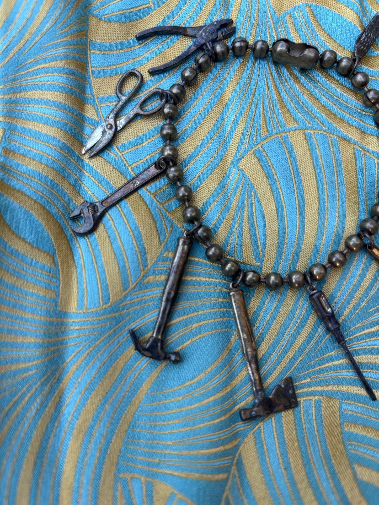 1960s brass miniature tools charm bracelet