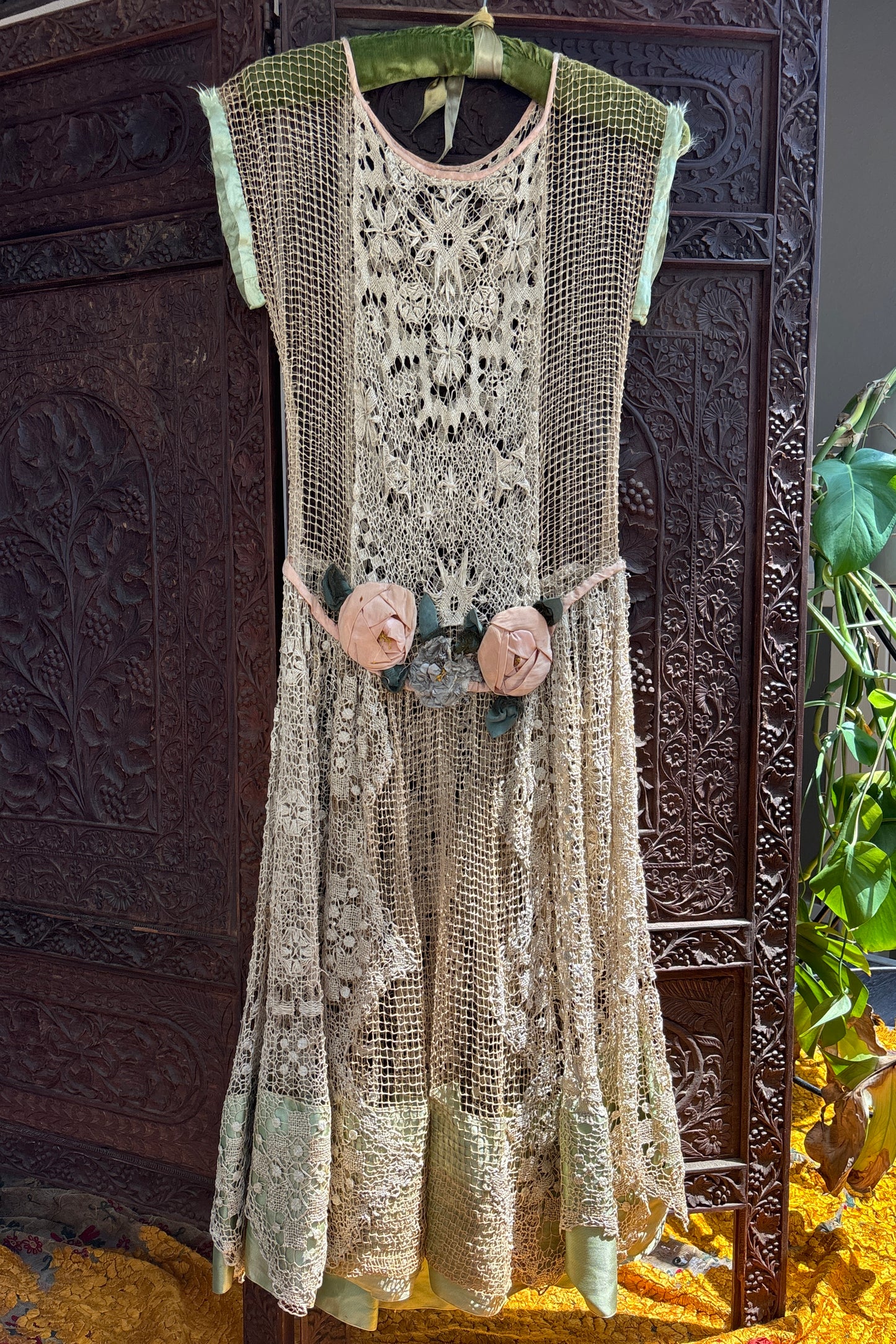 1920s spiderweb crochet net gown with rosettes