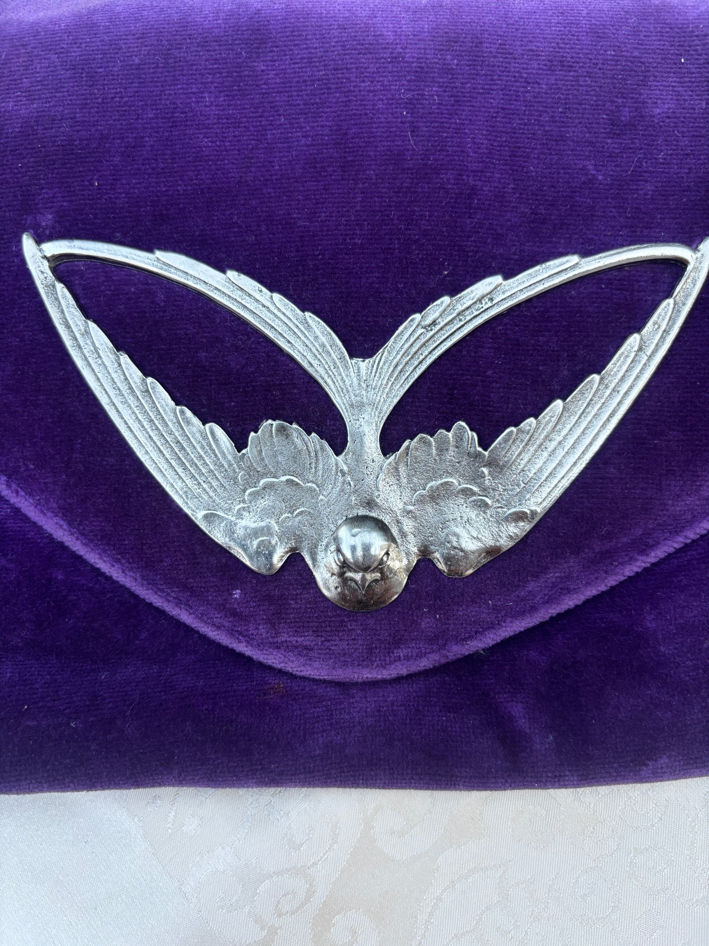 1960s nouveau violet velvet clutch with silver toned sparrow