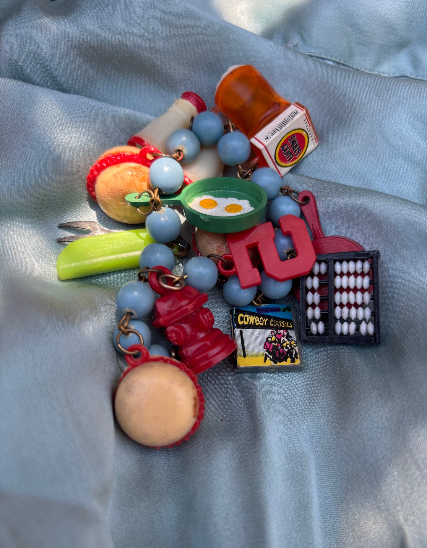 1960s “breakfast of champions” charm bracelet