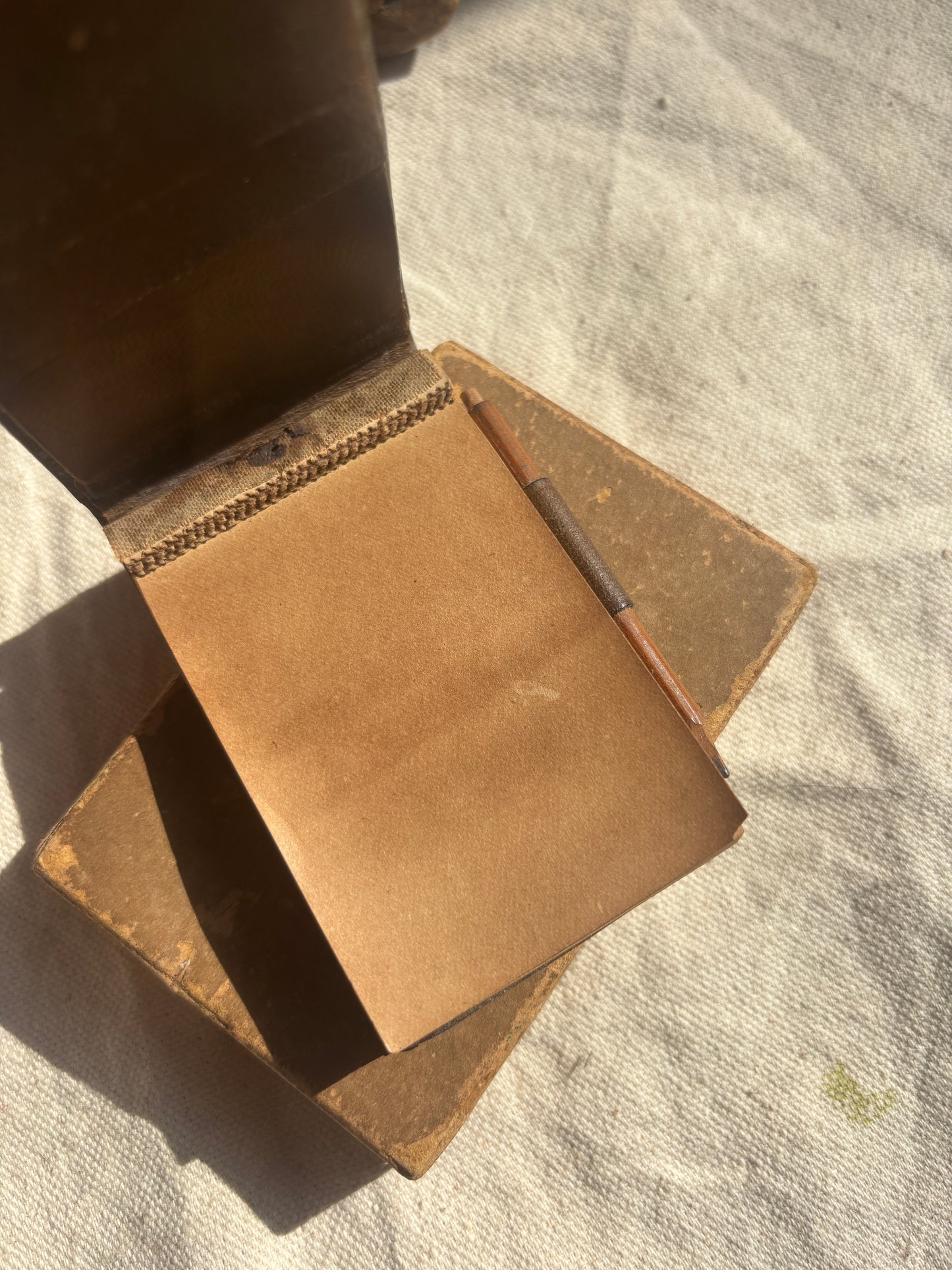 1910s nouveau tooled leather purse & notepad