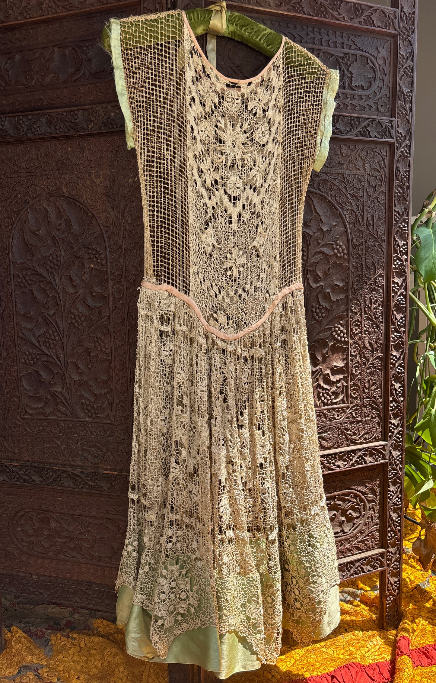 1920s spiderweb crochet net gown with rosettes